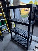 Front view of entire 4-tier resin shelving unit