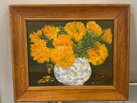 Front view showing framed Mildred Cutler oil painting with signature