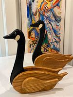 Front angle showing both carved wood ducks