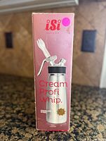 Front of retail box displaying iSi Cream Profi Whip
