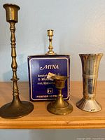 Front view of all candlesticks and box