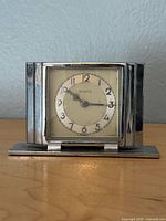 Front view showing square chrome case and Schatz dial