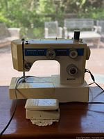 Front view of Necchi sewing machine and foot pedal