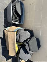 bin with stacked hexagon and wedge black foam panels