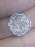 Maple leaf reverse showing date 1941 and denomination