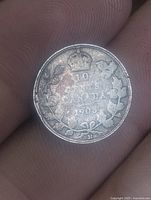 Reverse of 1903 H 10 cent coin with crown and wreath