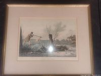 Full view framed lithograph under glass