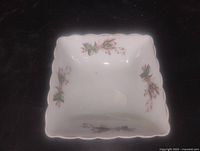 Top view of square porcelain bowl with floral decoration