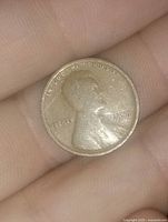 Obverse of worn Lincoln Wheat Cent showing profile and partial date
