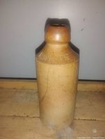 Front view showing full height, color, and embossed name