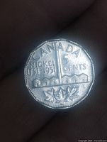 Reverse showing CANADA, NICKEL 1751-1951, 5 CENTS, refinery and maple leaves