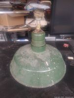 Top view of green enamel industrial light with socket assembly