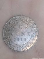 Reverse showing ONE CENT 1910 with wreath border