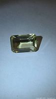 Front view of rectangular emerald-cut lemon citrine
