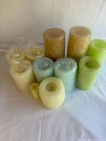 Group shot of 11 pastel flameless candles