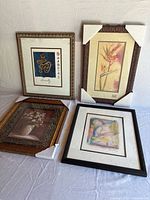 Group shot of four framed prints