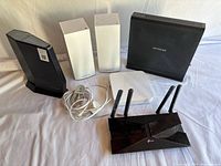 Group shot of all six networking devices and cables