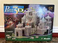 Front of box showing Puzz 3D Camelot 620-piece puzzle