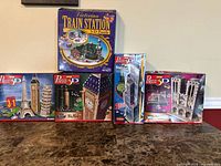 Five Puzz 3D puzzle boxes grouped together