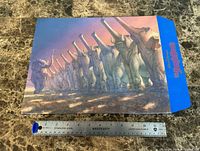 Envelope with elephant march artwork, ruler shows size