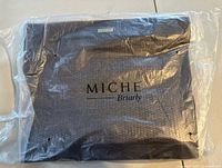 Sealed Miche Briarly shell in plastic