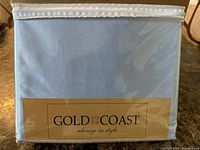 Front of sealed package showing brand and color