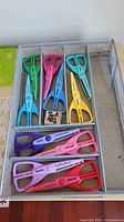 Decorative scissors in mesh tray
