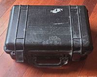 Top view of closed Pelican 1500 case showing scuffs and handle