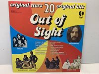 Front cover of 20 Out of Sight LP showing album art and artist photos