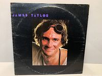 Front jacket showing album art and visible ring wear