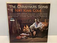 Front cover of Nat King Cole The Christmas Song LP showing artist name, album title, stereo label, sleeve wear visible at edges