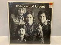 Front cover of The Best of Bread LP in shrink wrap with stickers visible