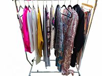 Front view of entire rack showing all 11 garments