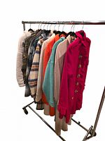 Full rack view showing variety of coats and jackets