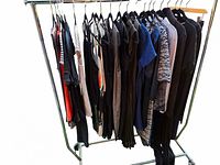 Rack with assorted designer women’s clothing items