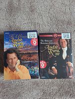Front view of both sealed André Rieu DVD box sets