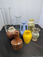 Group shot of all eight vases front view