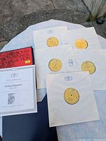 outer slipcase, booklet and five records displayed
