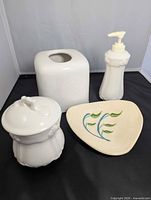 Full view of the four ceramic bathroom pieces
