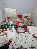 Full lot overview showing all glassware, towels, paper goods