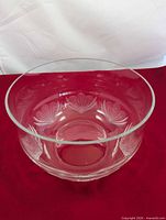 Angled top view showing overall bowl shape and etched floral pattern