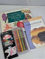 Overview of both pencil sets and two instructional books