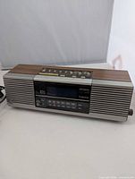 Front view of GE 7-3462A clock radio showing display, speaker grille and controls