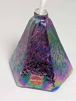 Front angled view showing iridescent glass texture, hexagonal shape, and Glass Eye U.S.A. label