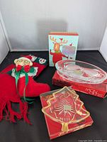 Lot overview showing both glass dishes, stocking ornament and gift box