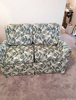 Front view of Kroehler loveseat sofa bed with cushions