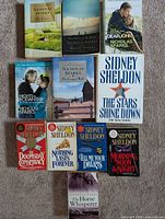 All ten books laid out front covers visible