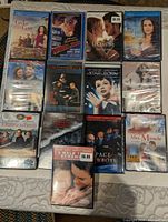 Overview of all DVD cases laid out on table