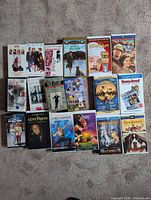 All 20 VHS tapes laid out front covers visible