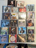 Full lot overview showing all 22 CD jewel cases
